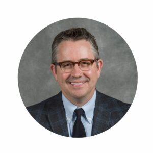 Jeff Neaton circle headshot on gray background